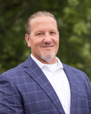 smiling person in professional attire